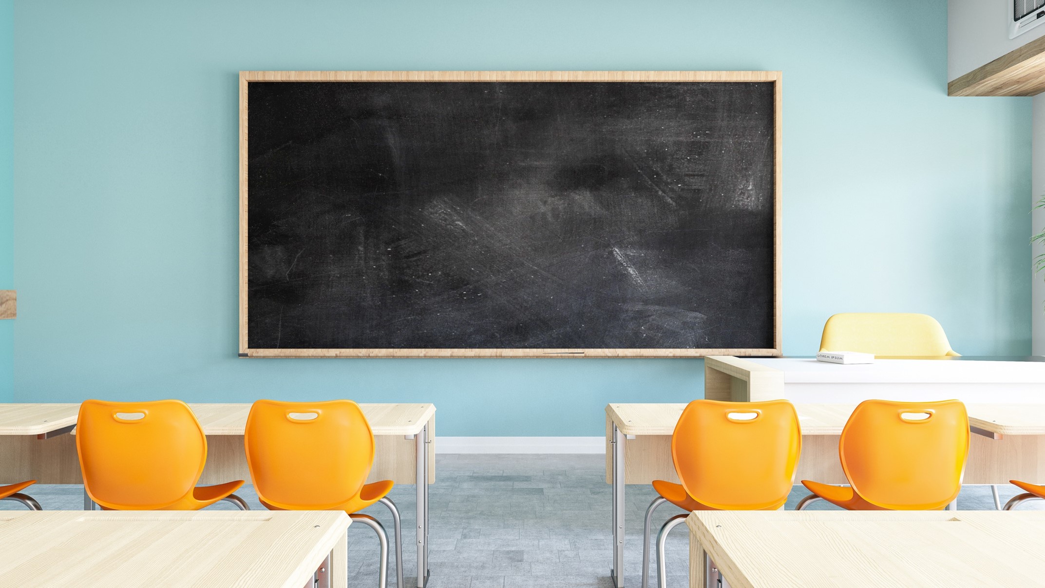 Classroom with blackboard and orange chairs